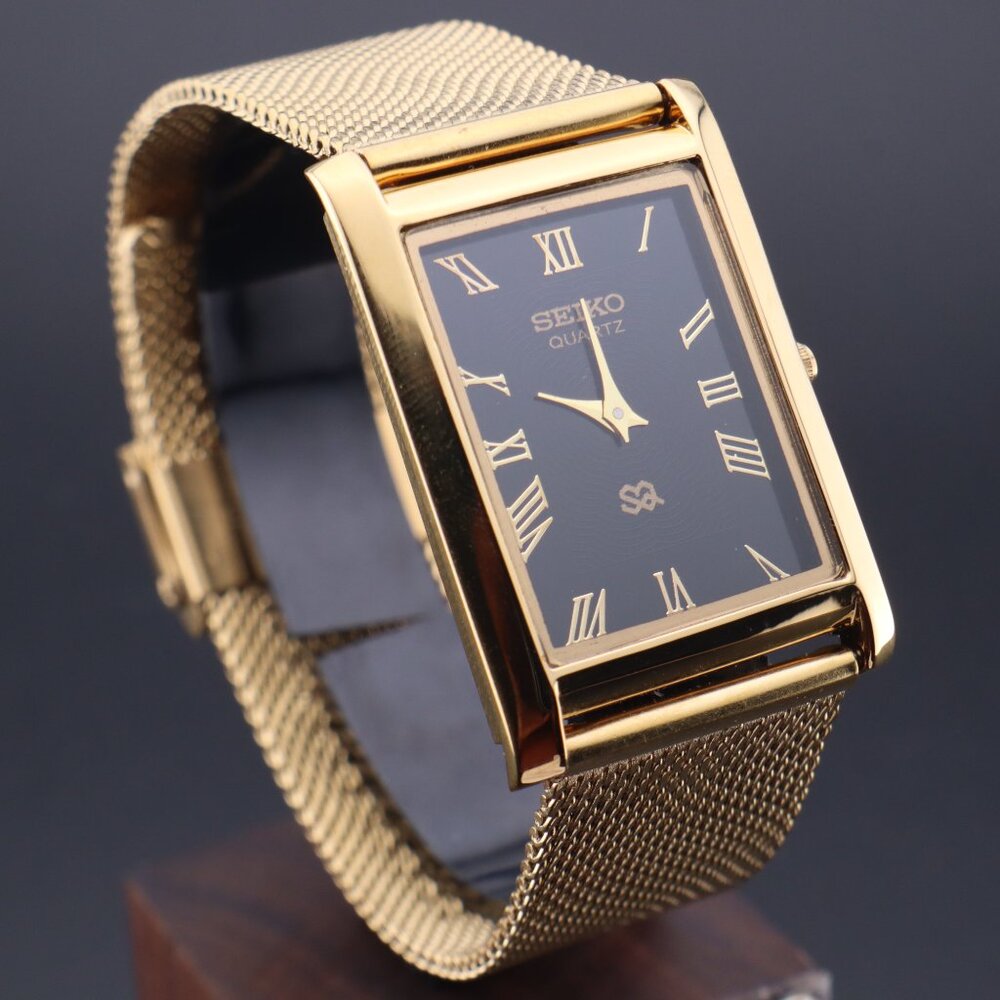 Seiko Gold Tone Case with Black Dial Mesh Bracelet Watch
